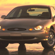 Illustration for article titled An Early Design For The Ugly 1996 Ford Taurus Looked A Lot Like A Tesla Model 3